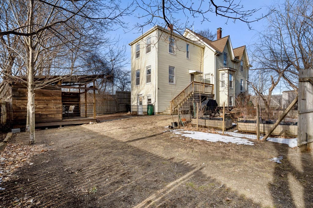 98 Pine Street Swampscott, MA 01907 - Photo 31 of 37 a view of a house with a snow on the road and a building