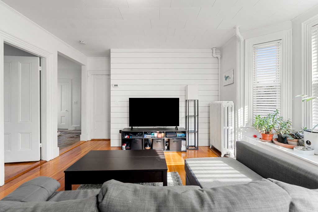 98 Pine Street Swampscott, MA 01907 - Photo 4 of 37 a living room with furniture and a flat screen tv