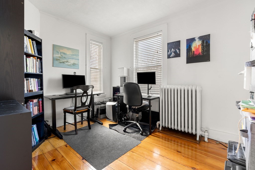 98 Pine Street Swampscott, MA 01907 - Photo 5 of 37 a view of a livingroom with workspace and a couch