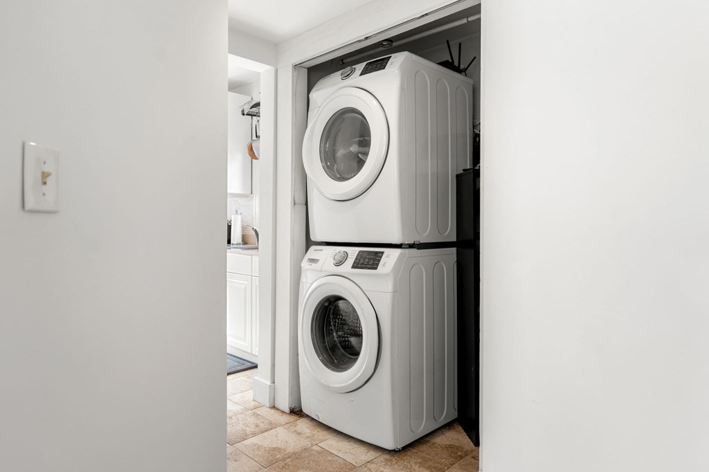 98 Pine Street Swampscott, MA 01907 - Photo 7 of 37 a utility room with dryer and washer