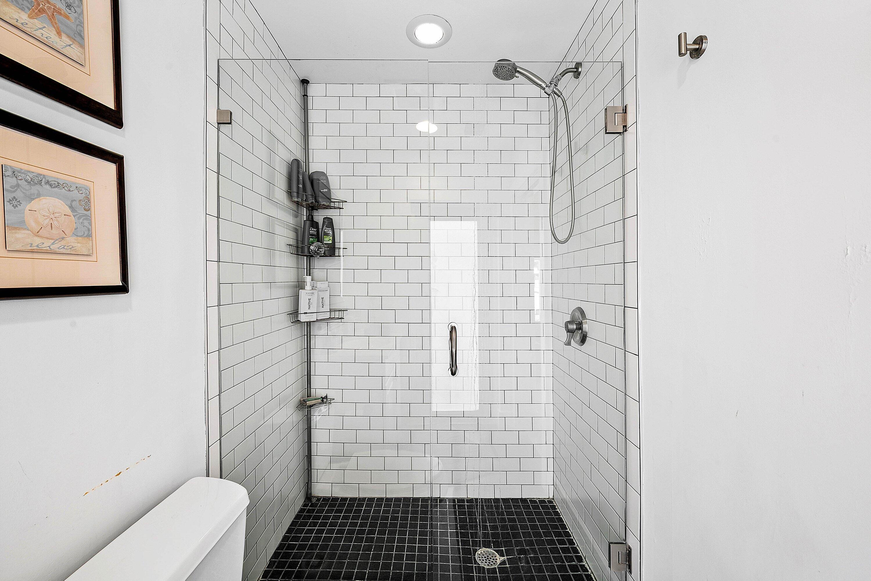 740 Northeast 36th Street Boca Raton, FL 33431 - Photo 22 of 50 a bathroom with a shower and toilet