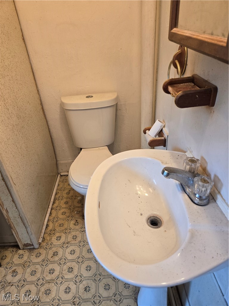 7968 River Styx Road Medina, OH 44256 - Photo 20 of 27 Bathroom with toilet and sink