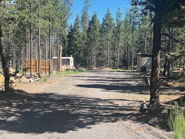 17174 Azusa Road Bend, OR 97707 - Photo 1 of 8 a view of a house with a yard