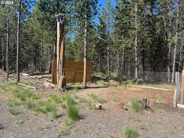 17174 Azusa Road Bend, OR 97707 - Photo 5 of 8 a backyard of a house with lots of green space