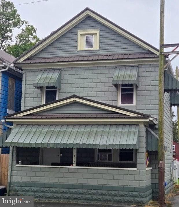 a view of a house with a balcony