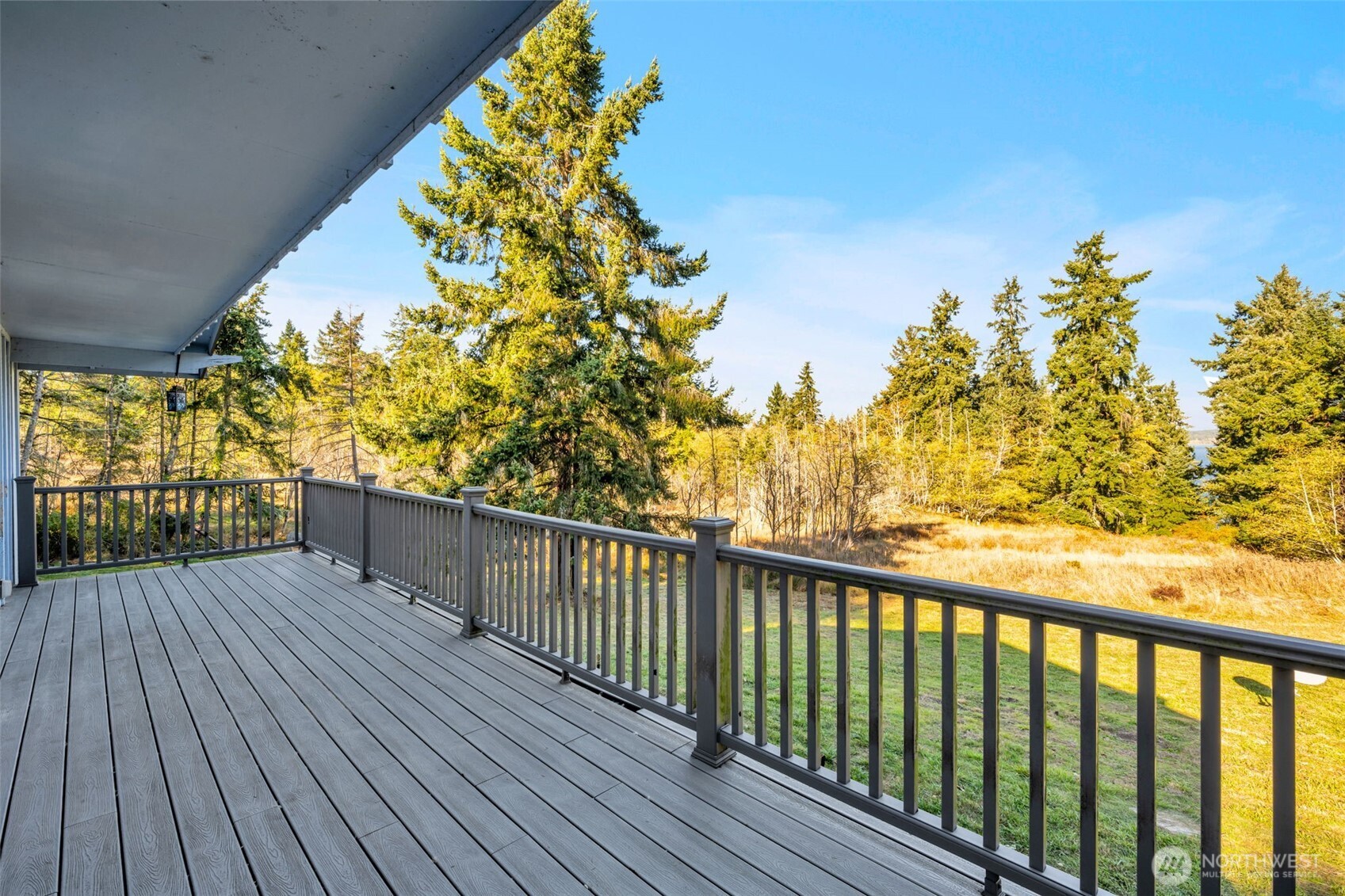 10318 Morris Boulevard Steilacoom, WA 98388 - Photo 11 of 38 a balcony with wooden floor