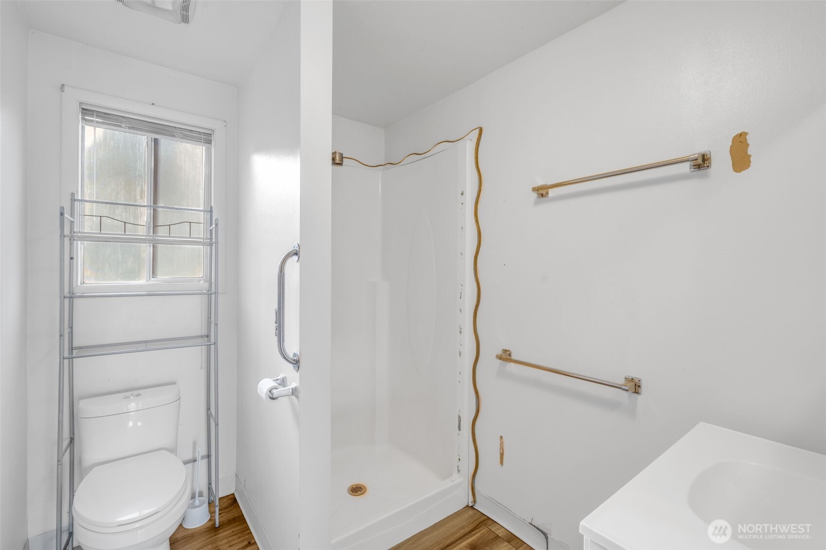 10318 Morris Boulevard Steilacoom, WA 98388 - Photo 14 of 38 a bathroom with a shower and a toilet