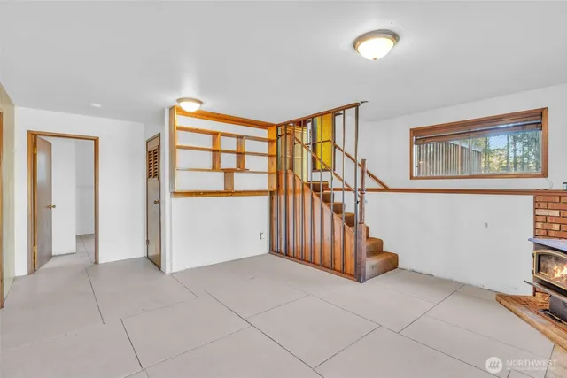 a view of livingroom with furniture and floor to ceiling window
