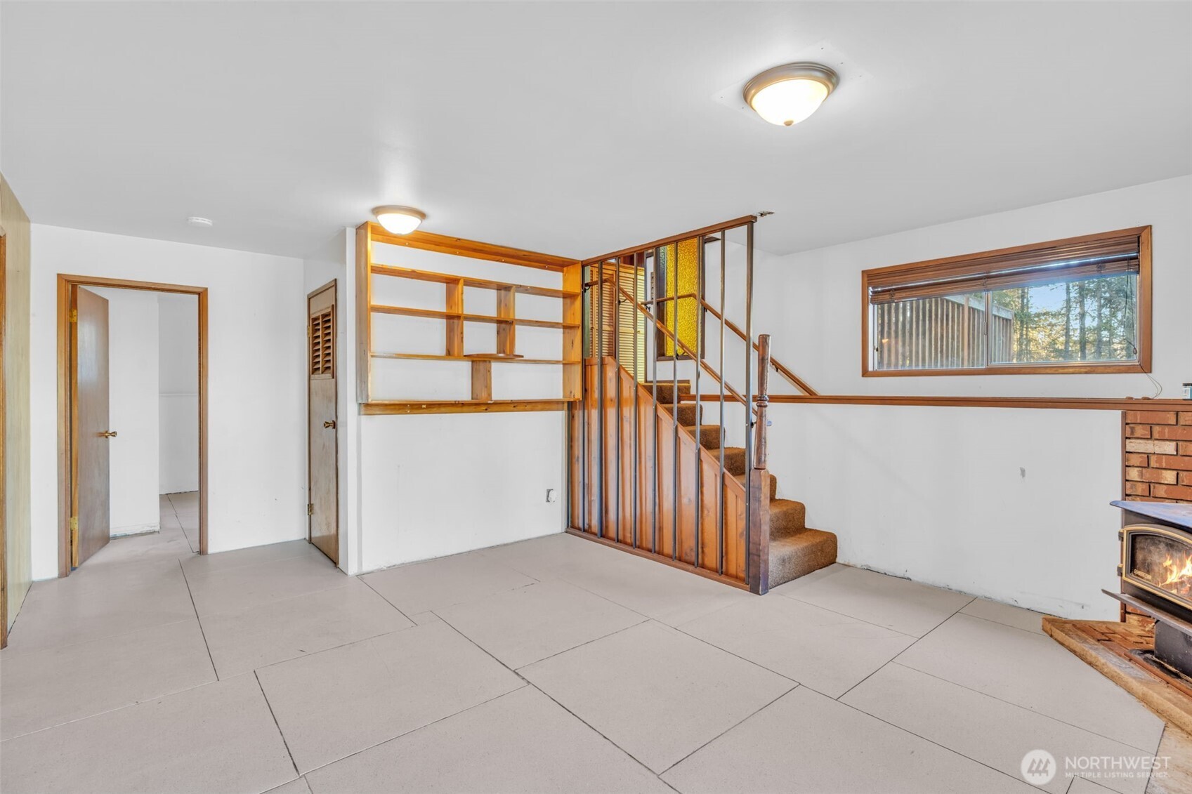 10318 Morris Boulevard Steilacoom, WA 98388 - Photo 18 of 38 a view of livingroom with furniture and floor to ceiling window