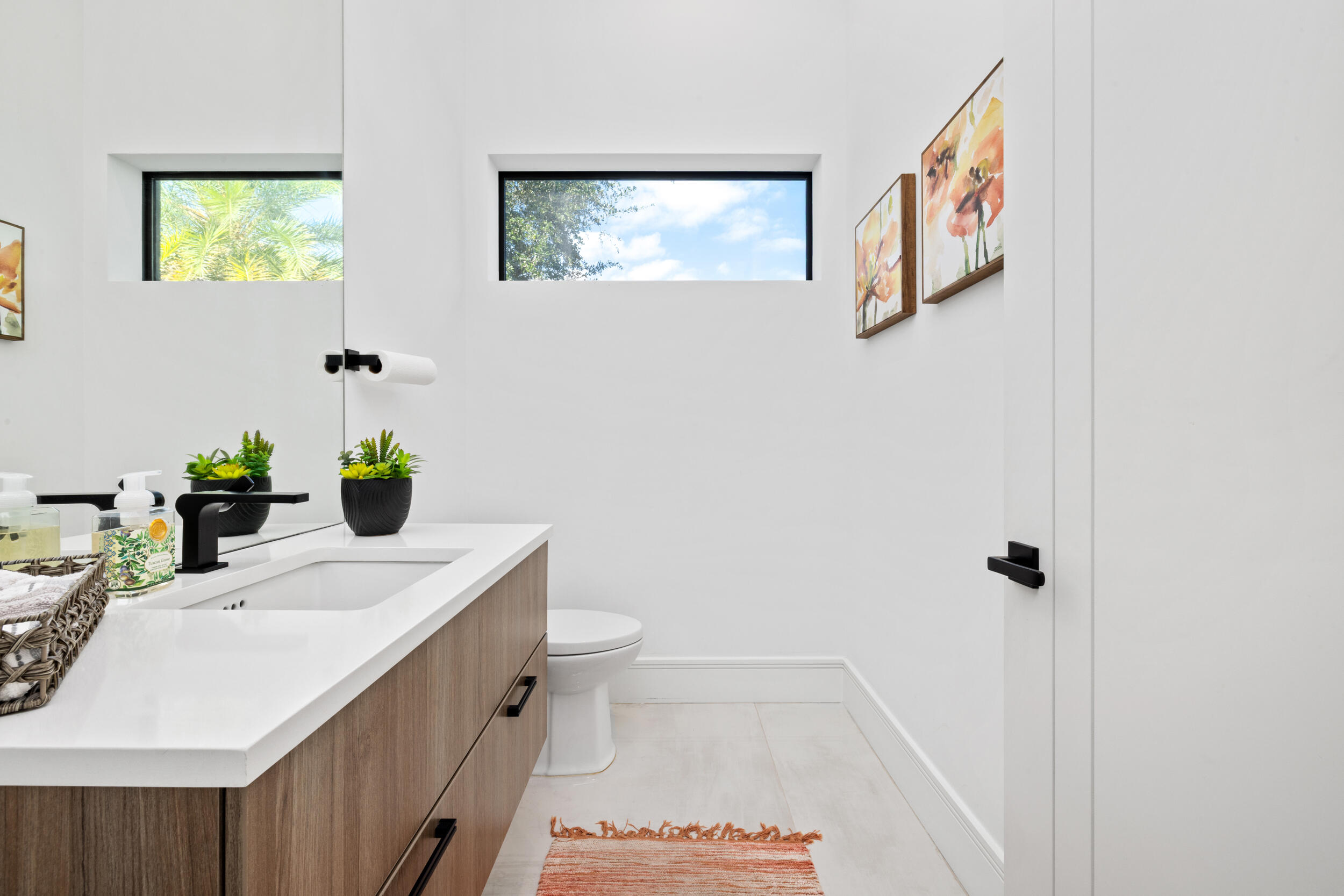 10 Coconut Road Delray Beach, FL 33444 - Photo 31 of 41 a bathroom with a sink and a toilet
