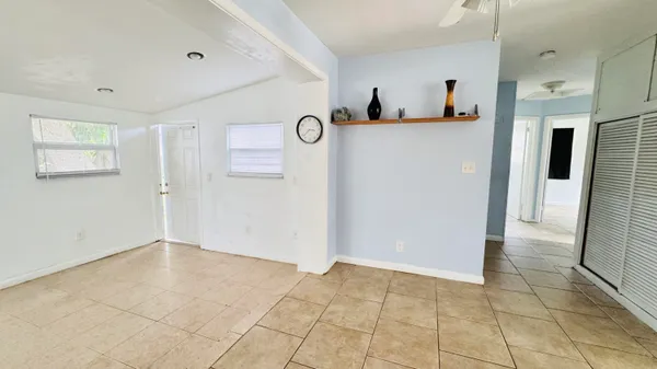 a view of a bathroom from a hallway