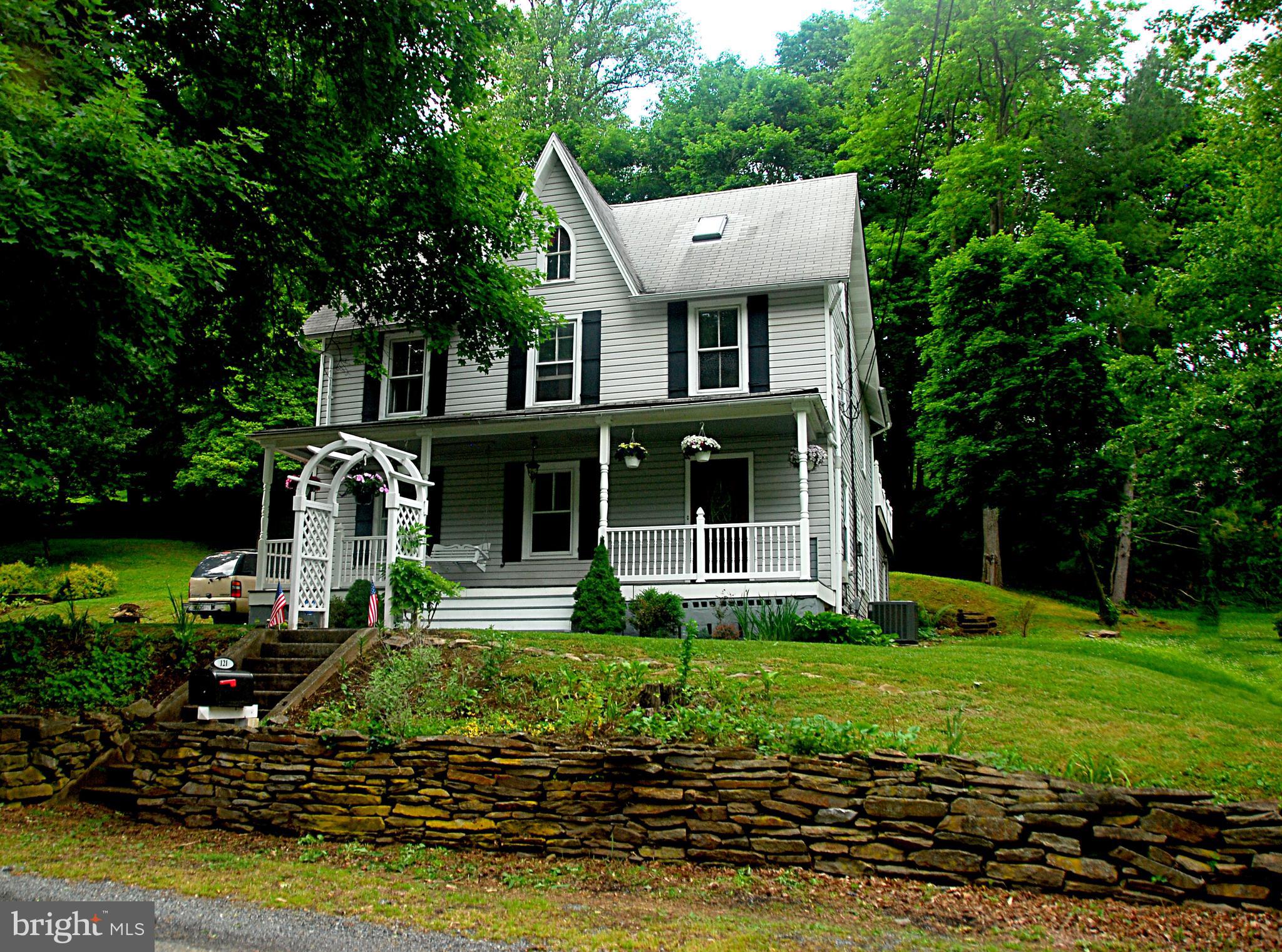 121 Chesterville Road Landenberg, PA 19350 - Photo 1 of 35 a front view of a house with garden