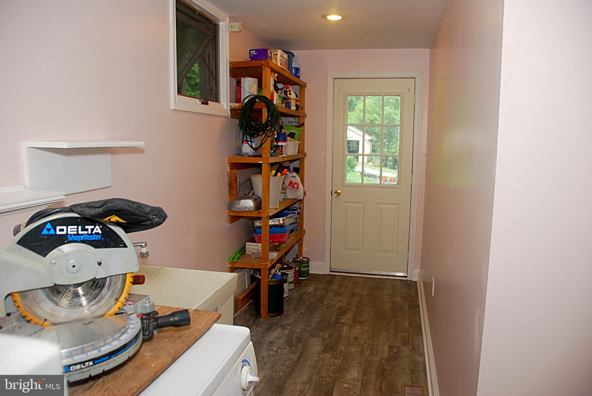 121 Chesterville Road Landenberg, PA 19350 - Photo 20 of 35 a view of a workspace with furniture and a window