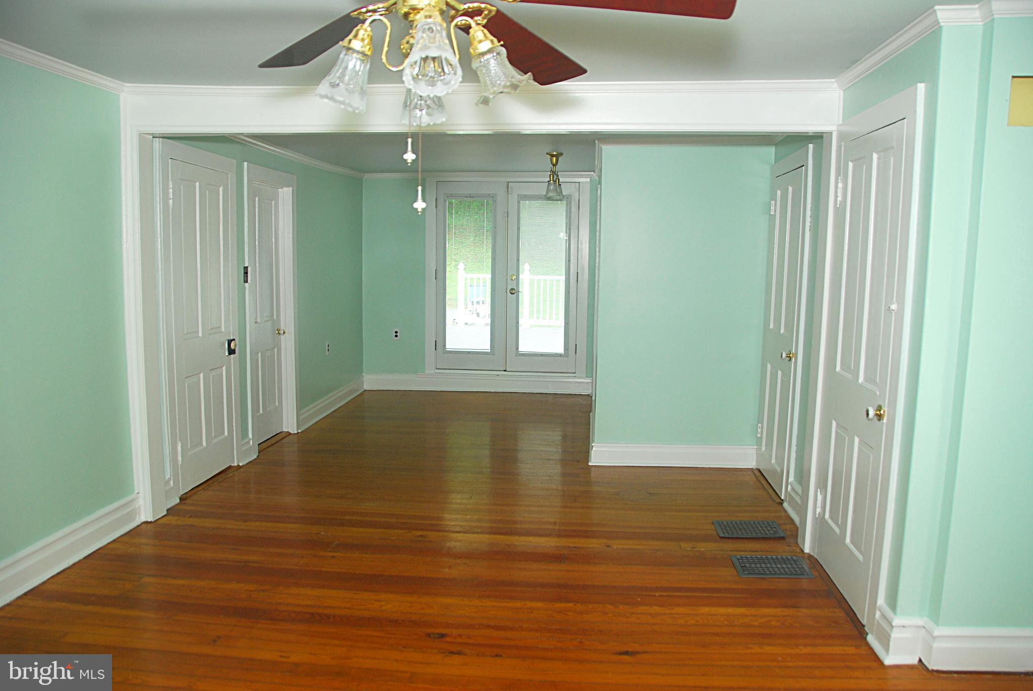 121 Chesterville Road Landenberg, PA 19350 - Photo 28 of 35 a view of an empty room with wooden floor