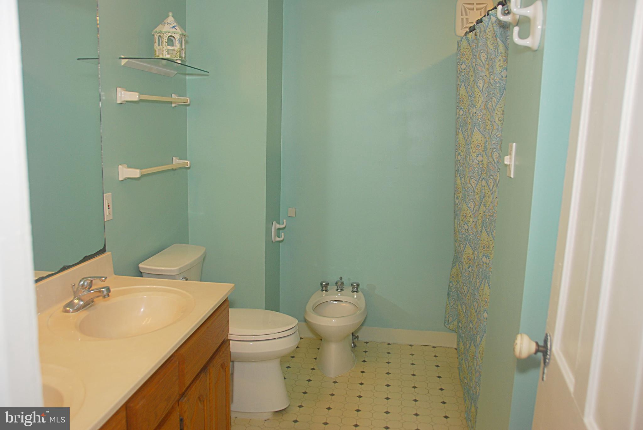 121 Chesterville Road Landenberg, PA 19350 - Photo 29 of 35 a bathroom with a sink a toilet and shower