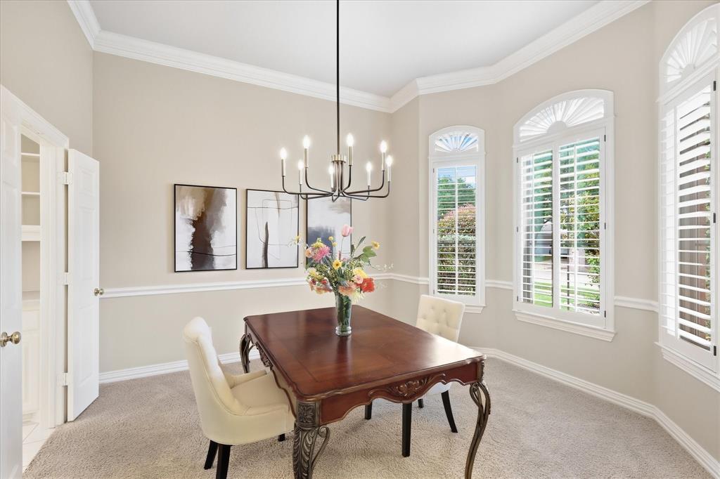 1447 Falls Road Coppell, TX 75019 - Photo 10 of 39 Classic Plantation Shutters Across the Front of House.