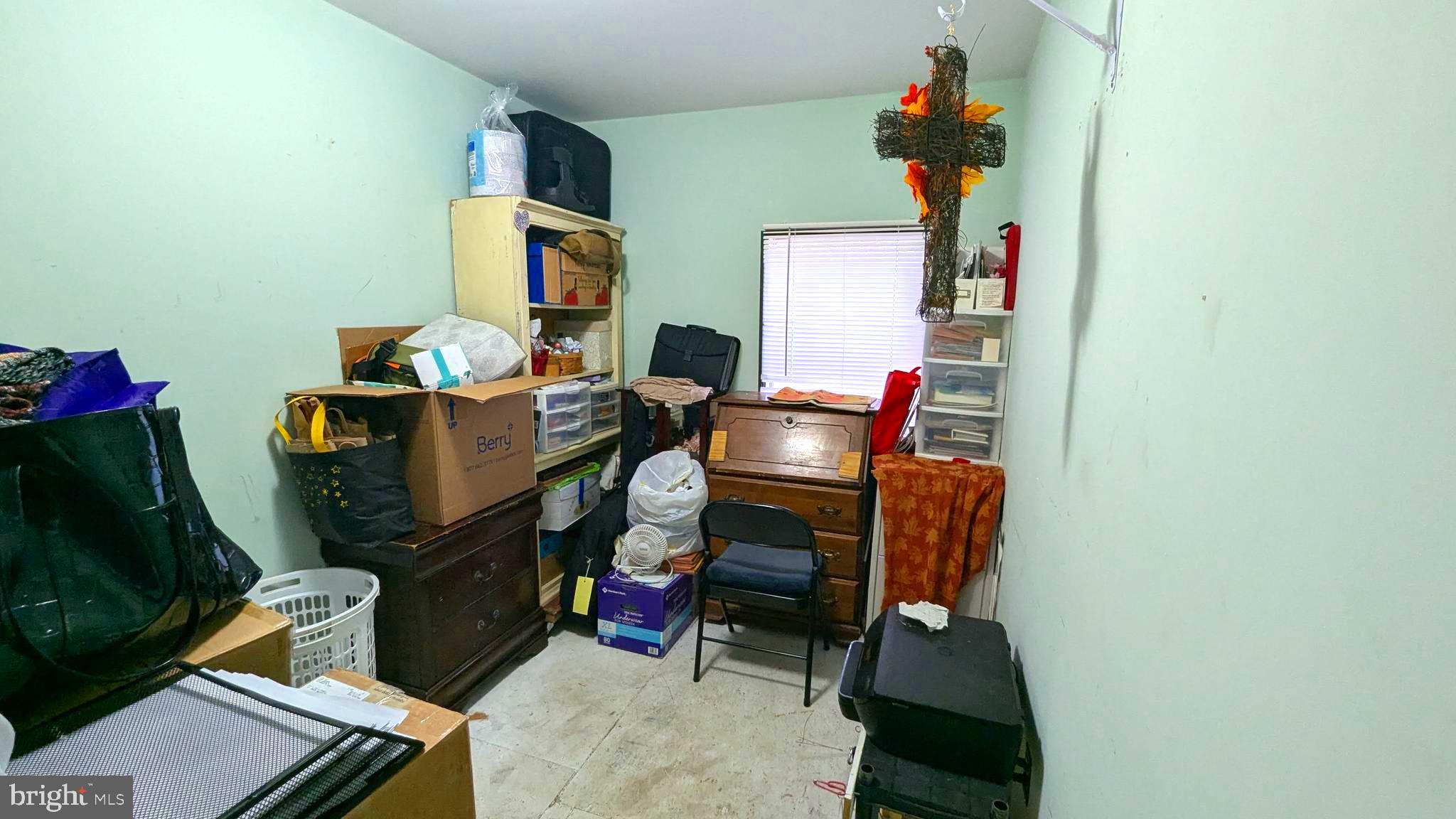 26835 Walker Road, Unit 56043 Seaford, DE 19973 - Photo 10 of 11 a room with furniture and wooden floor