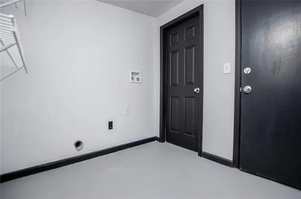 a front view of a house with garage