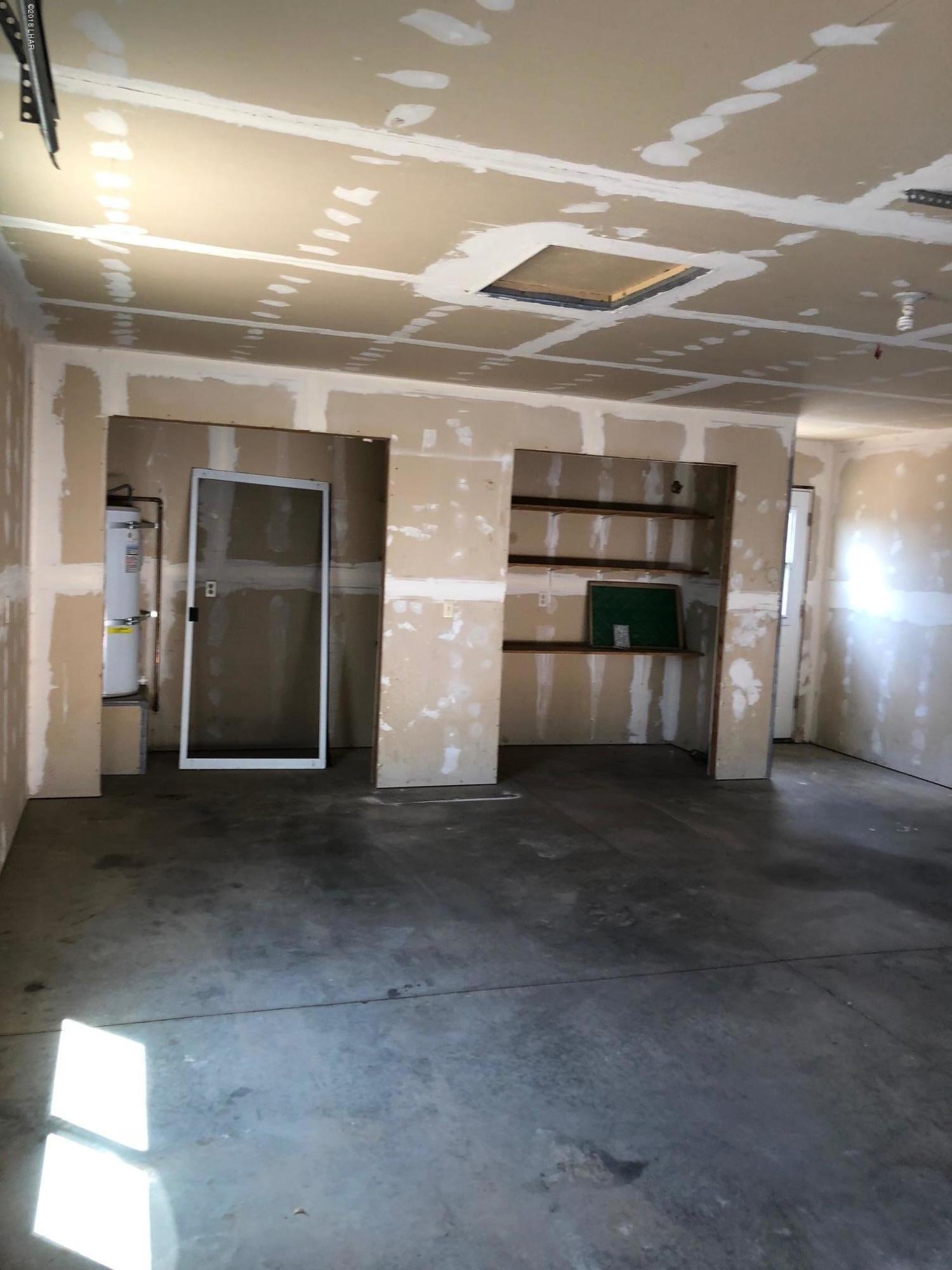 3739 Hope Road Golden Valley, AZ 86413 - Photo 21 of 26 an empty room with a empty space