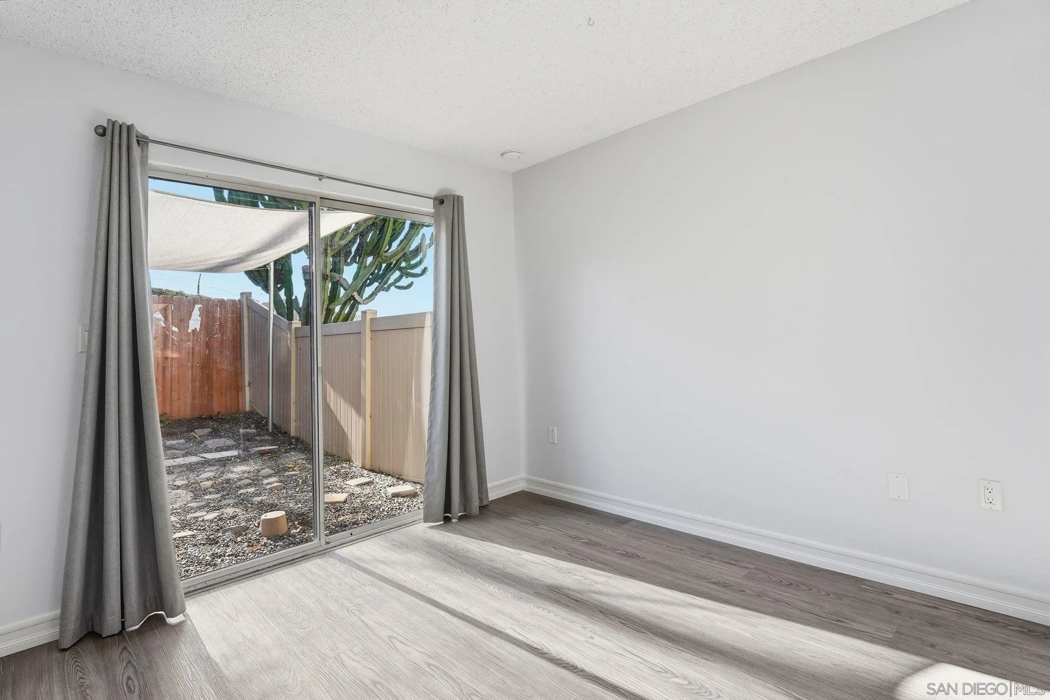 8753 Spring Canyon Drive Spring Valley, CA 91977 - Photo 14 of 43 a view of a room with a large window