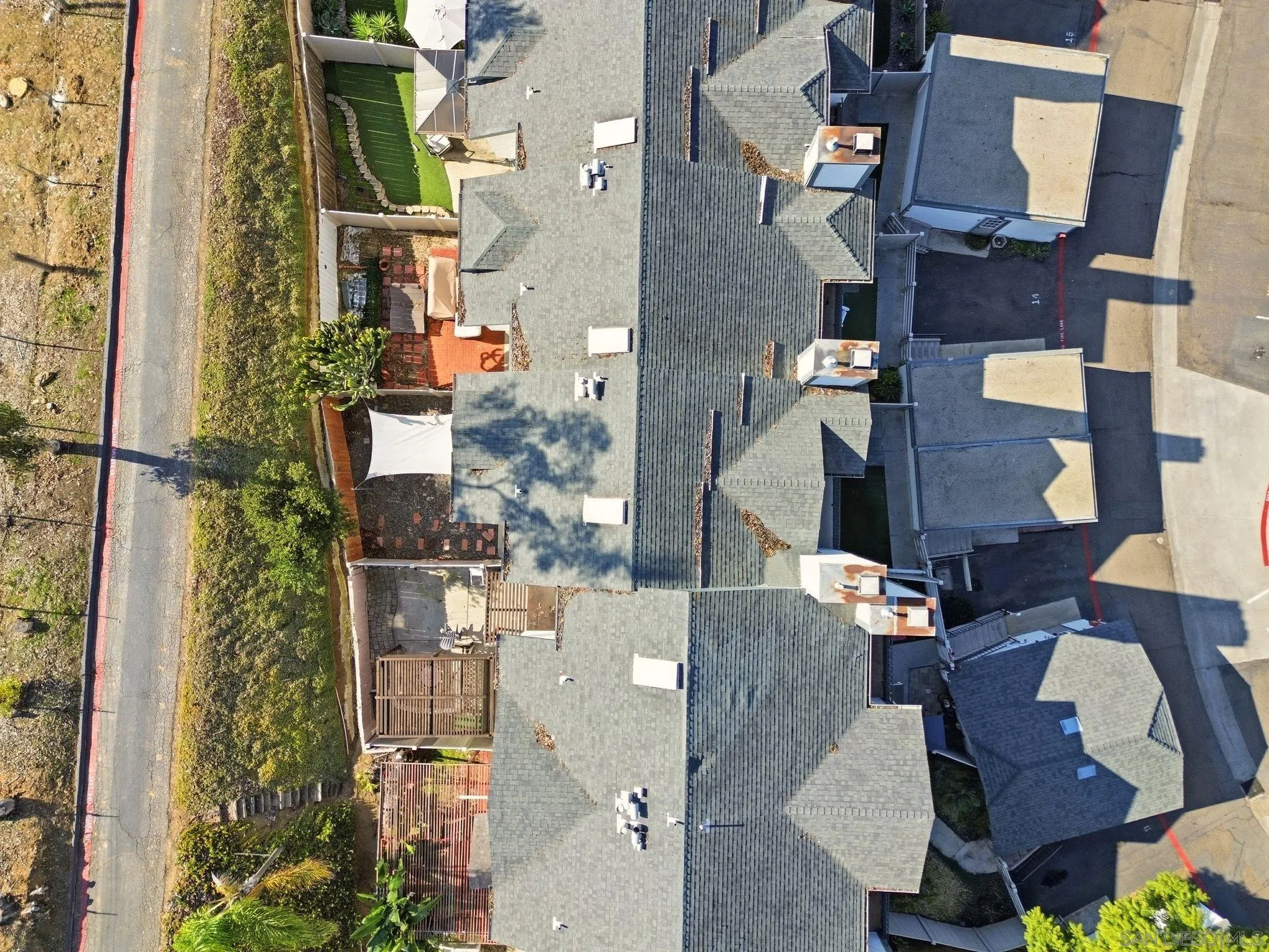 8753 Spring Canyon Drive Spring Valley, CA 91977 - Photo 34 of 43 an aerial view of residential houses with outdoor space