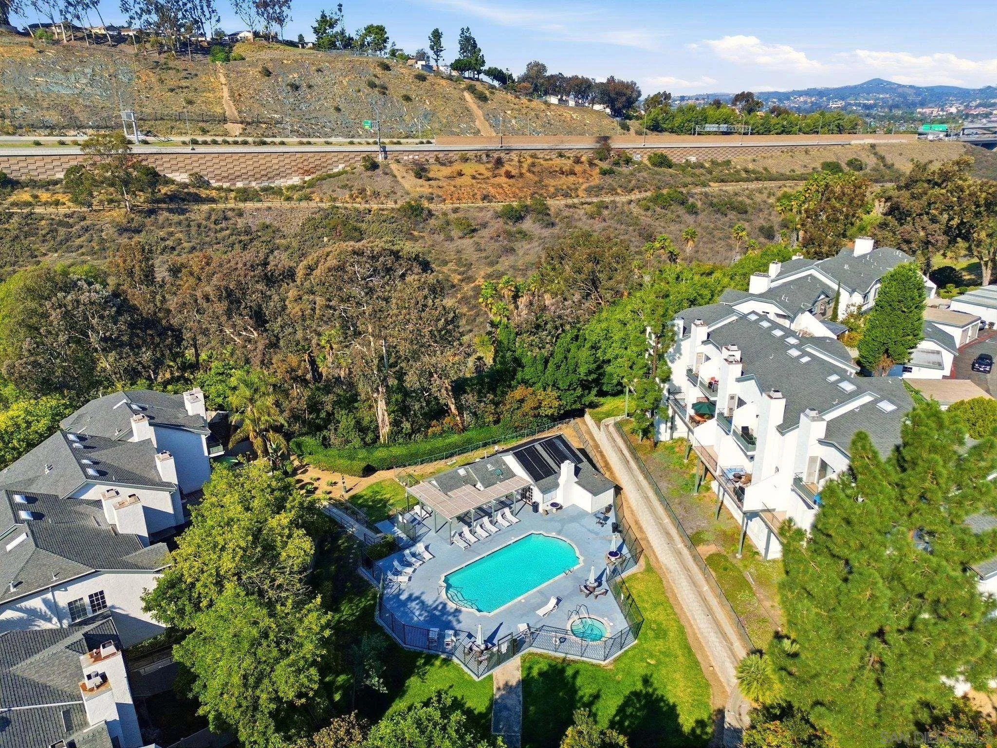 8753 Spring Canyon Drive Spring Valley, CA 91977 - Photo 35 of 43 an aerial view of residential houses with outdoor space