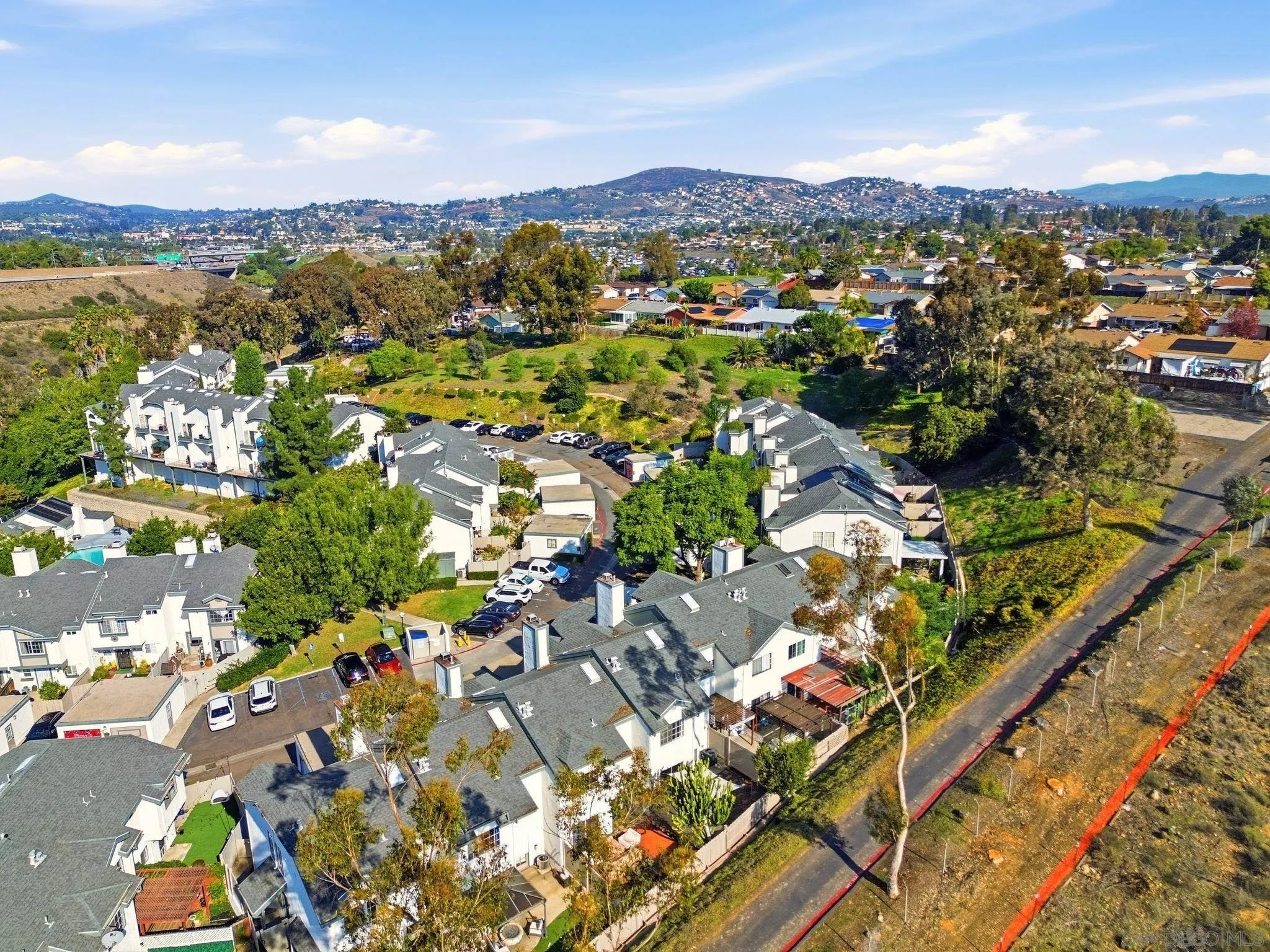 8753 Spring Canyon Drive Spring Valley, CA 91977 - Photo 40 of 43 an aerial view of residential houses with outdoor space