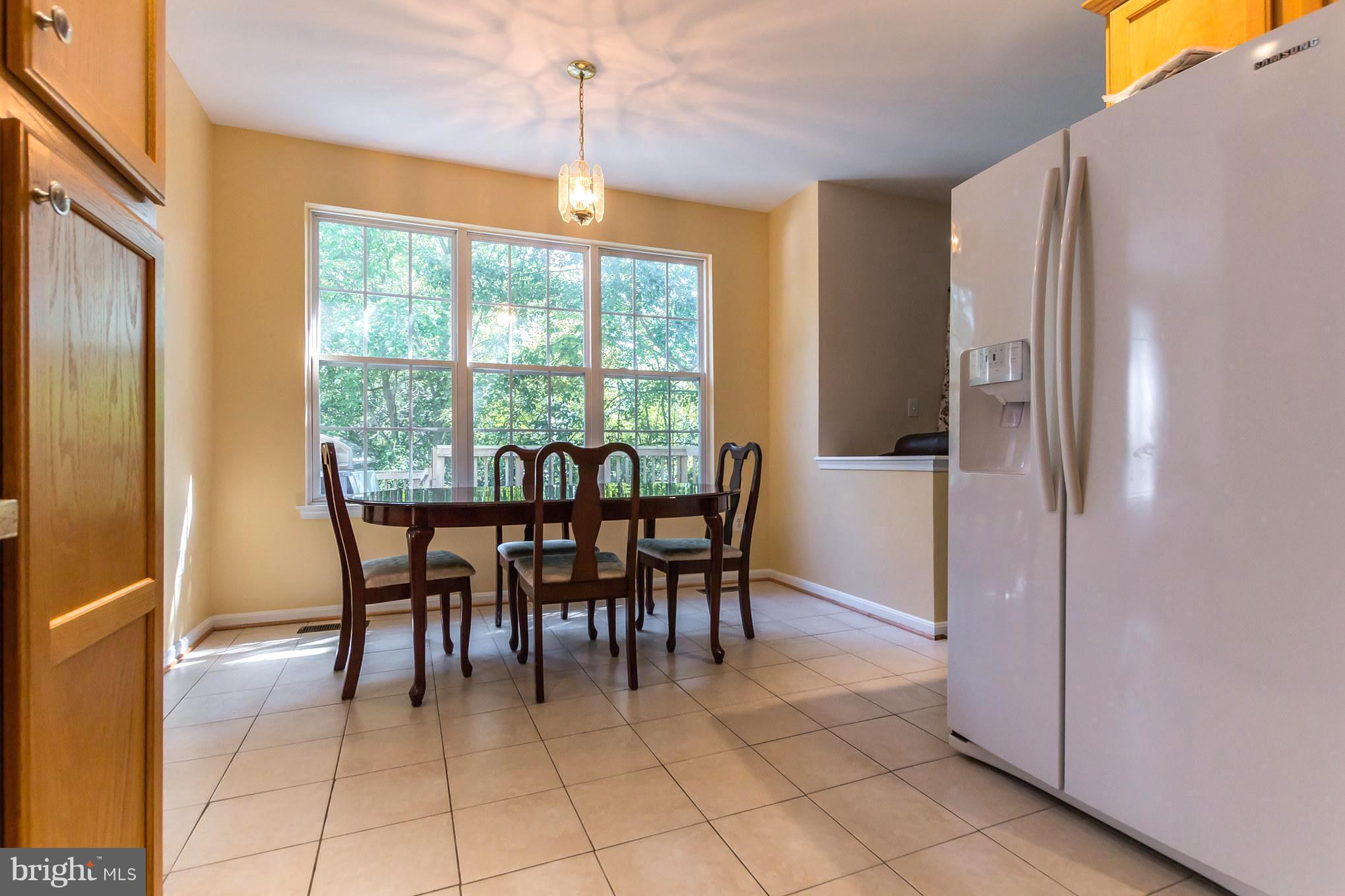 8100 Pepper Ridge Way Gaithersburg, MD 20877 - Photo 10 of 30 Kitchen with Sunny Tablespace Area