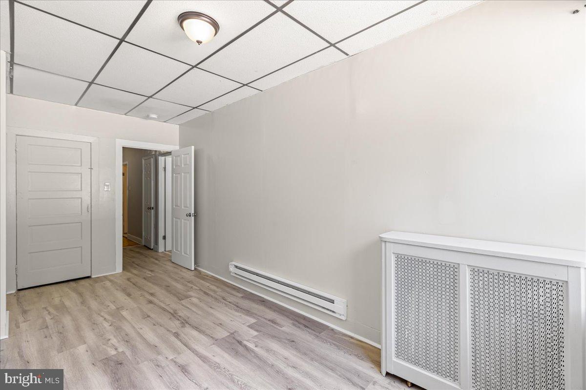 245 Warren Street Beverly, NJ 08010 - Photo 14 of 20 a view of a room with wooden floor