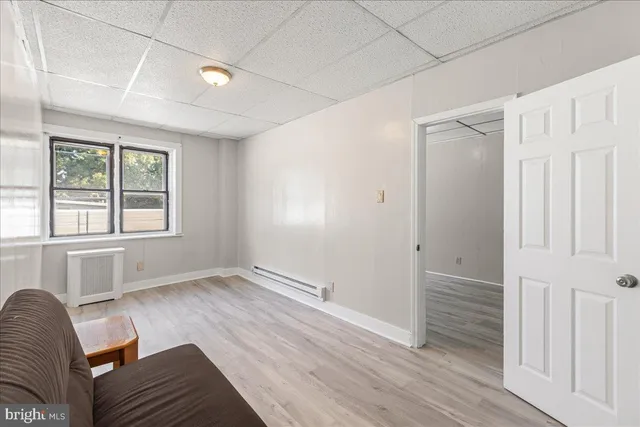 a view of livingroom with furniture wooden floor and window