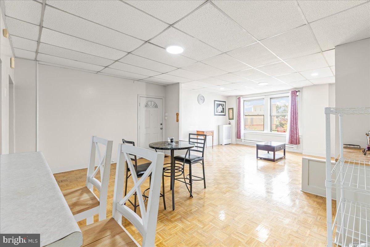 245 Warren Street Beverly, NJ 08010 - Photo 3 of 20 a view of a livingroom with furniture and a table