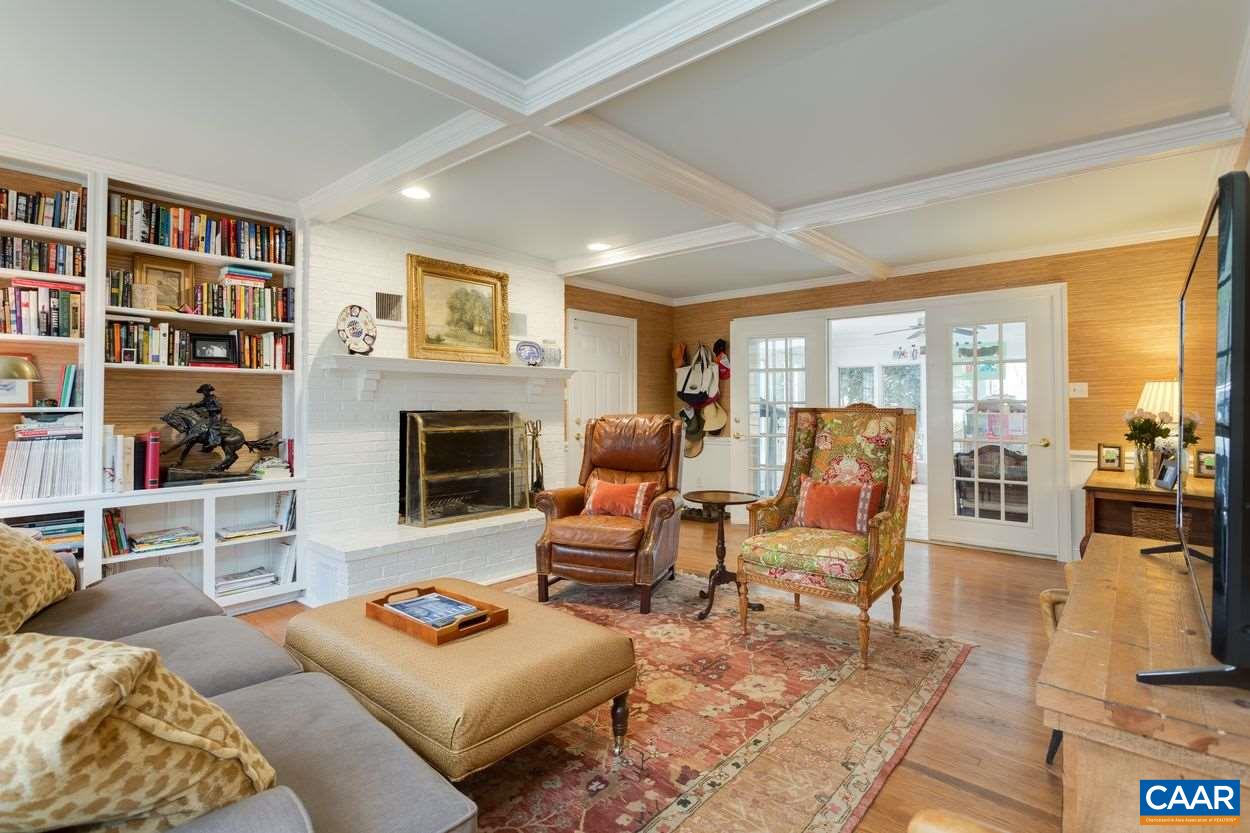 2485 Thrush Road Charlottesville, VA 22901 - Photo 12 of 23 a living room with furniture hard wood floor and a fireplace