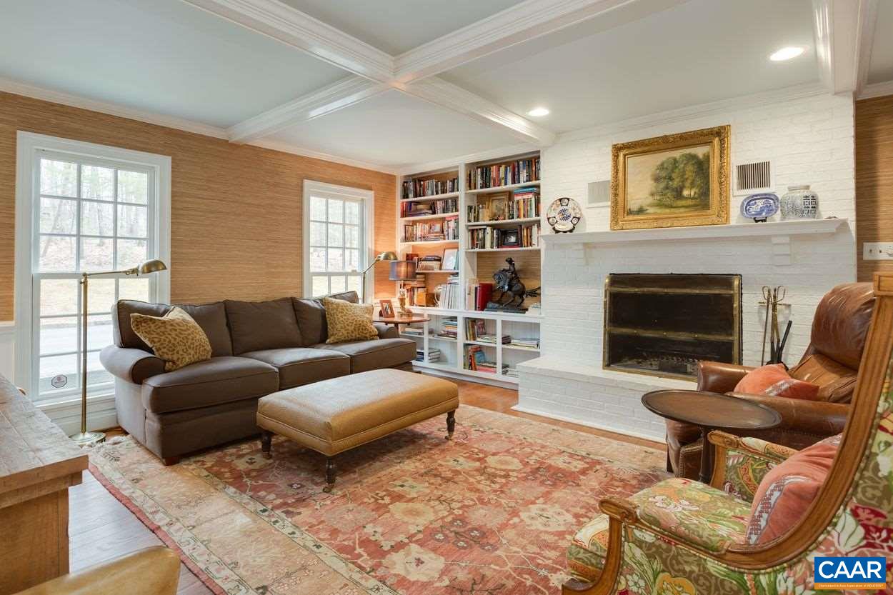 2485 Thrush Road Charlottesville, VA 22901 - Photo 13 of 23 a living room with furniture a fireplace and a large window