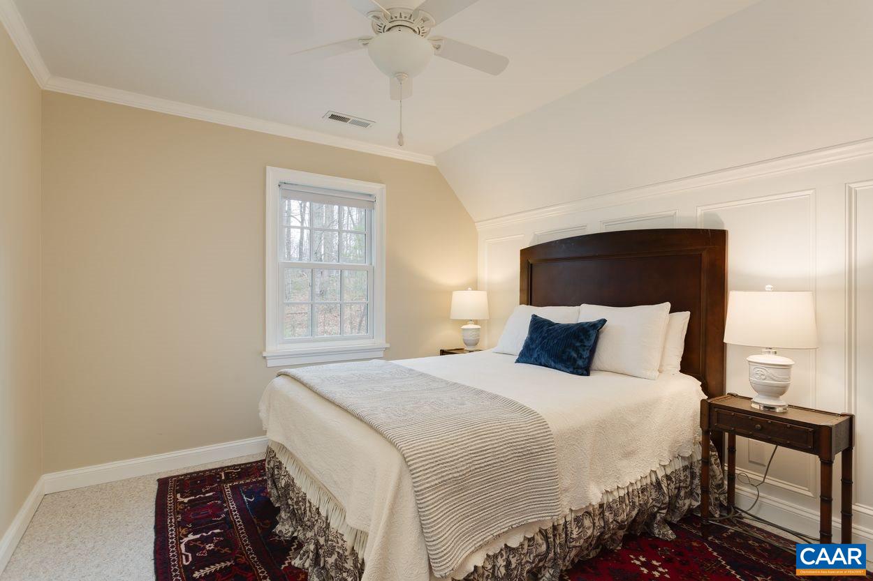 2485 Thrush Road Charlottesville, VA 22901 - Photo 20 of 23 a bedroom with a bed and a window