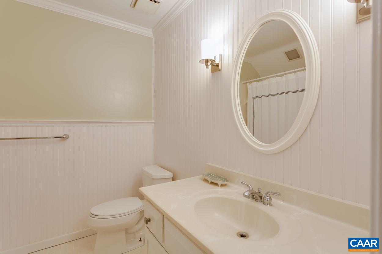 2485 Thrush Road Charlottesville, VA 22901 - Photo 21 of 23 a bathroom with a sink and a mirror