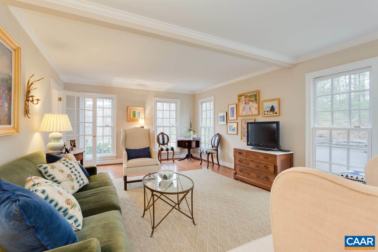 2485 Thrush Road Charlottesville, VA 22901 - Photo 5 of 23 a living room with furniture a flat screen tv and a window