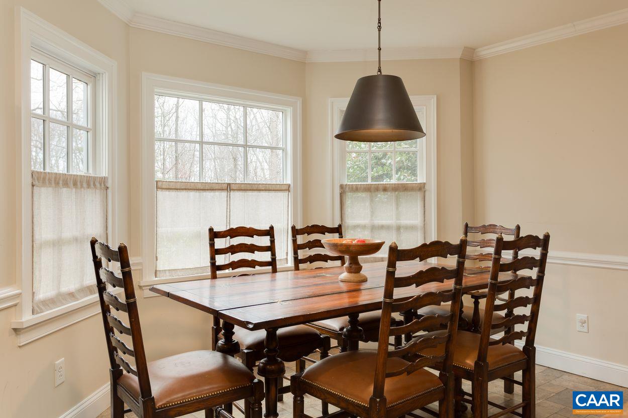 2485 Thrush Road Charlottesville, VA 22901 - Photo 10 of 23 a view of a dining room with furniture and window