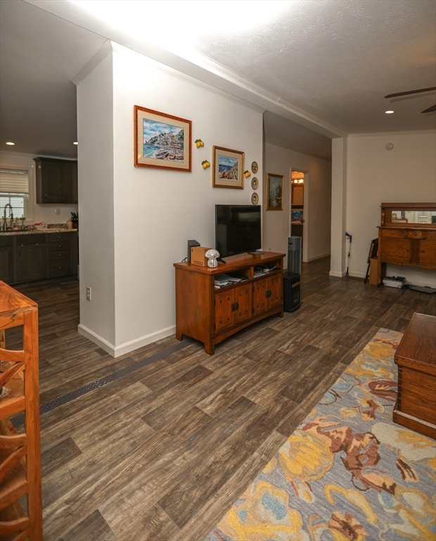 3 B Street Merrimac, MA 01860 - Photo 23 of 41 a living room with furniture and a flat screen tv