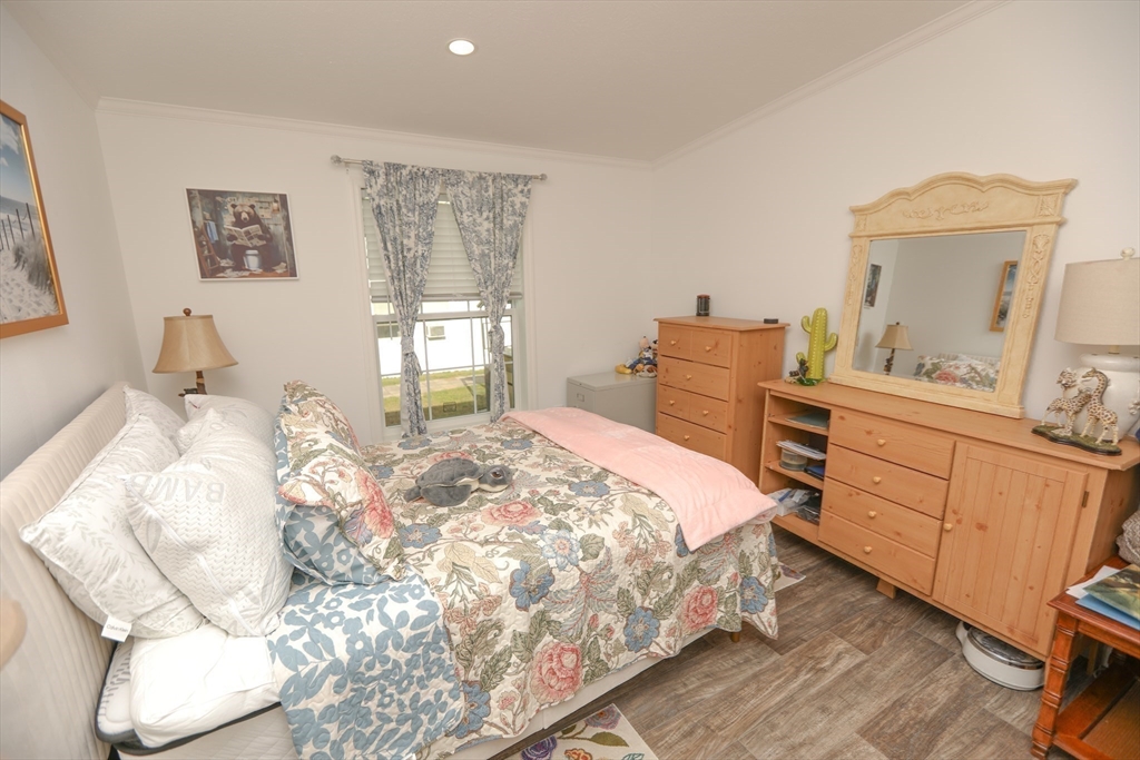 3 B Street Merrimac, MA 01860 - Photo 29 of 41 a bedroom with a bed and a dresser