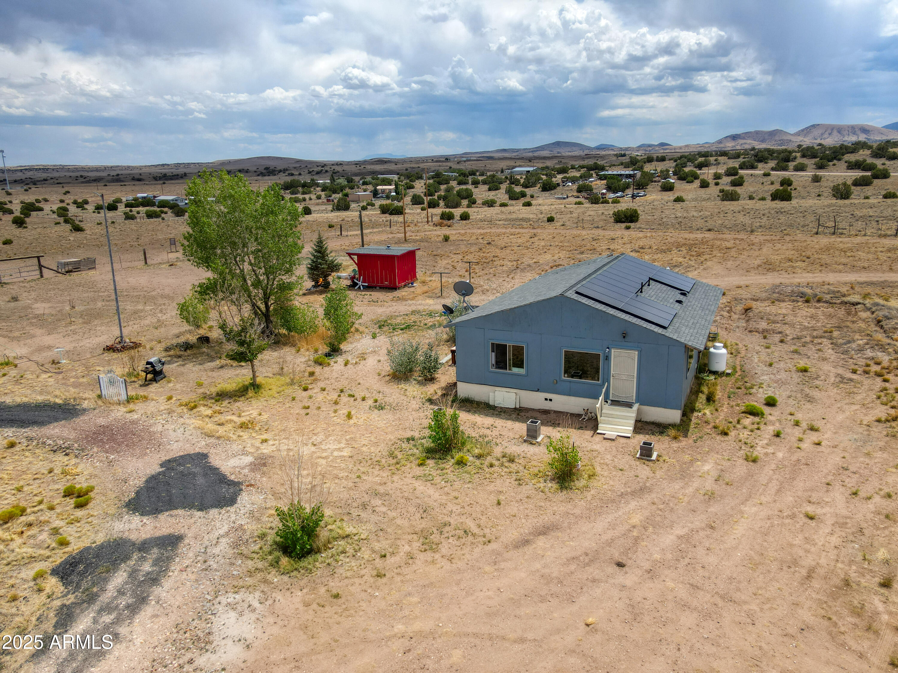 70 N5207 Concho, AZ 85924 - Photo 22 of 28 a aerial view of a house with a yard