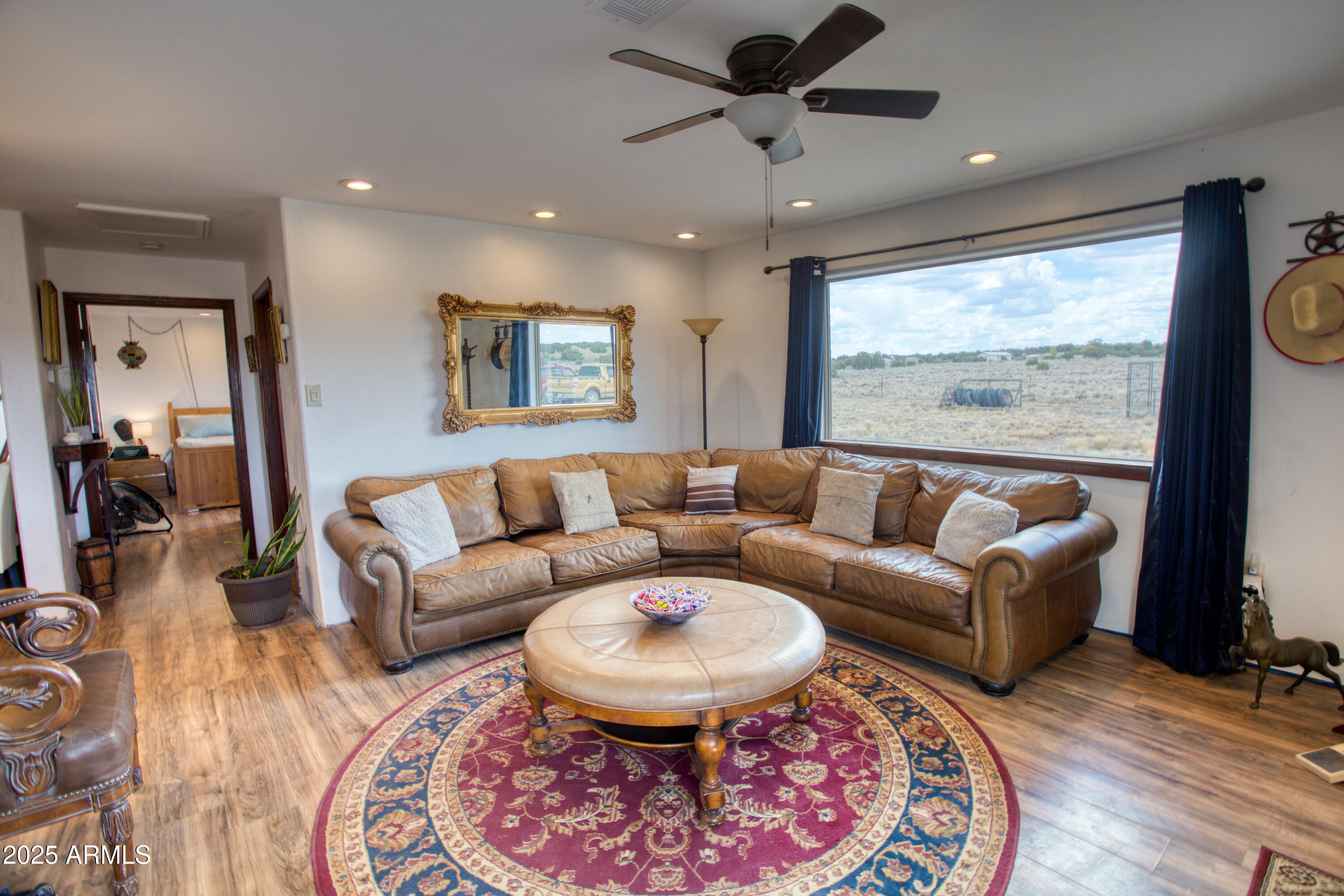 70 N5207 Concho, AZ 85924 - Photo 3 of 28 a living room with furniture and a large window