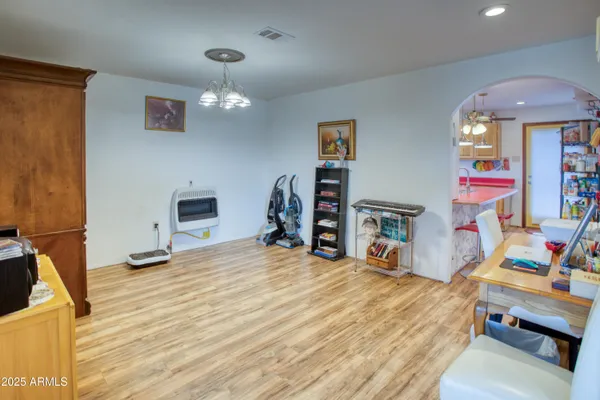 a room with furniture and a wooden floor