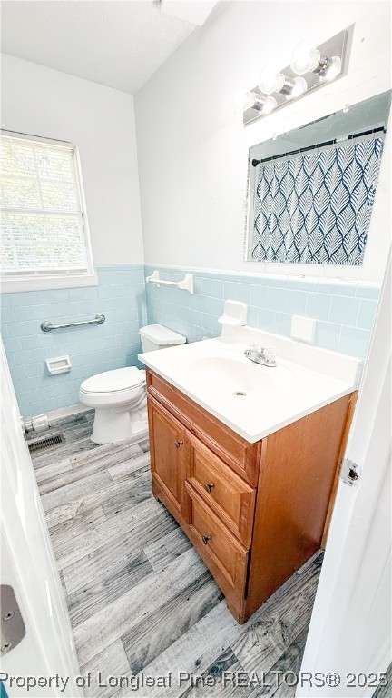 666 Jacobs Road Maxton, NC 28364 - Photo 19 of 30 a bathroom with a sink toilet and mirror