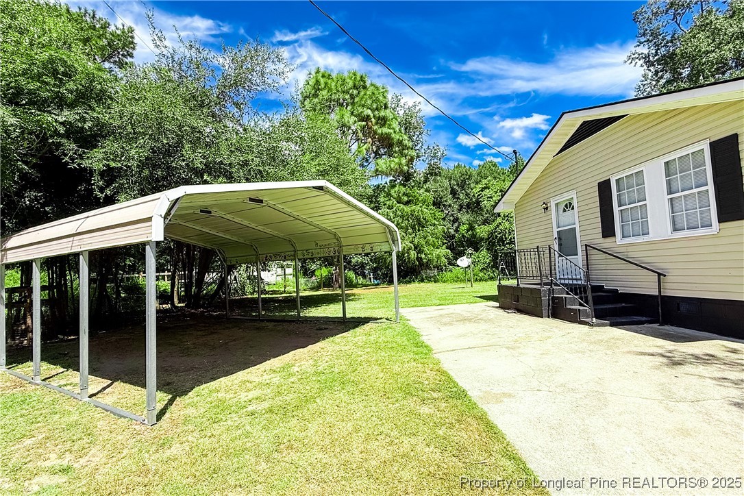 666 Jacobs Road Maxton, NC 28364 - Photo 10 of 30 a view of swimming pool with a patio