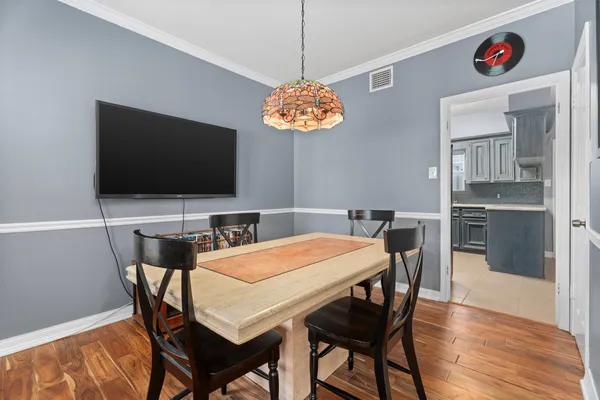a view of a dining room with furniture