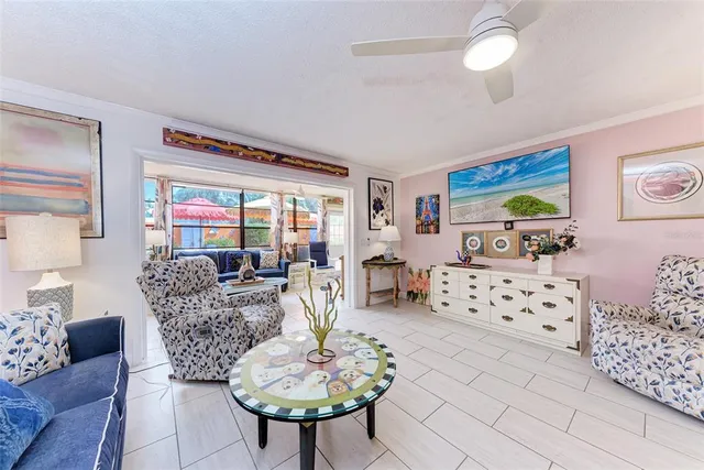 a living room with furniture and a table