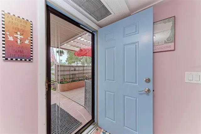a kitchen with stainless steel appliances granite countertop a refrigerator sink and stove