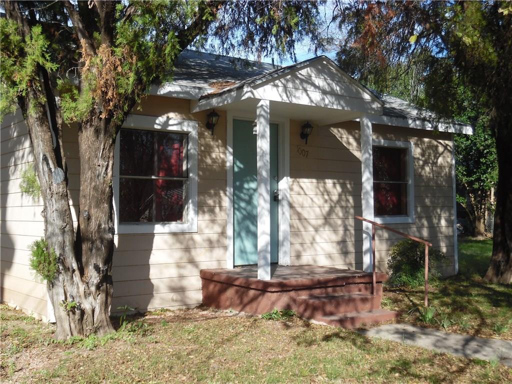 1007 West College Avenue Comanche, TX 76442 - Photo 1 of 1 a view of a house with a yard