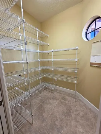 a view of a room with rack on the wall