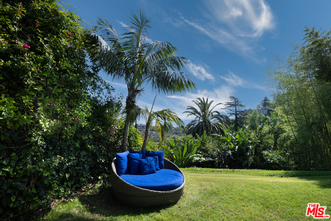 1466 Bel Air Road Los Angeles, CA 90077 - Photo 29 of 35 a view of a backyard with plants and tree